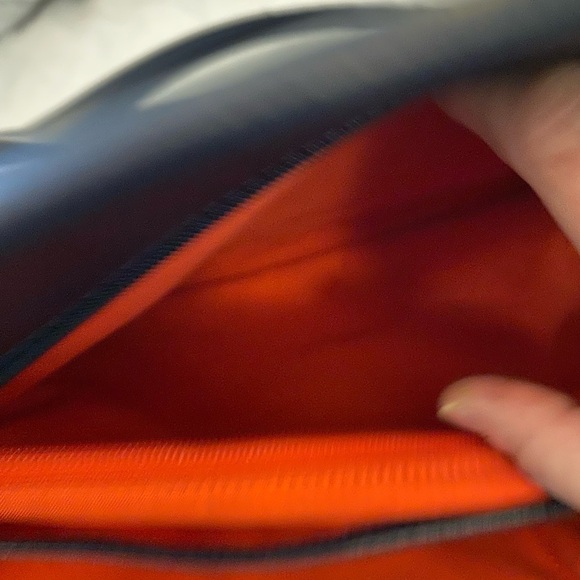Tory Burch zip up Robinson navy blue tote with orange interior. - Picture 6 of 11